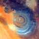 Illustration for article titled The Eye of the Sahara Is An Enigmatic Desert Landmark